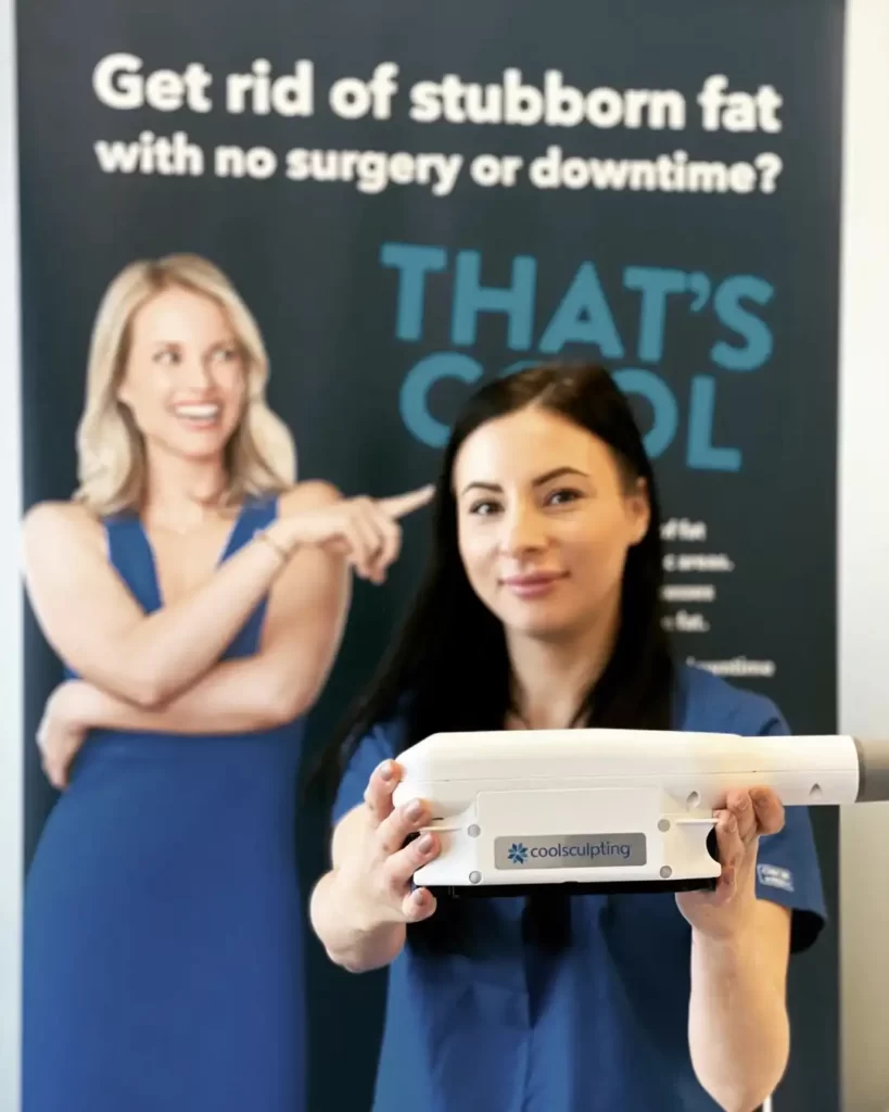 A nurse holding CoolSculpting device at Lakeshore Vein & Aesthetics Clinic, Kelowna